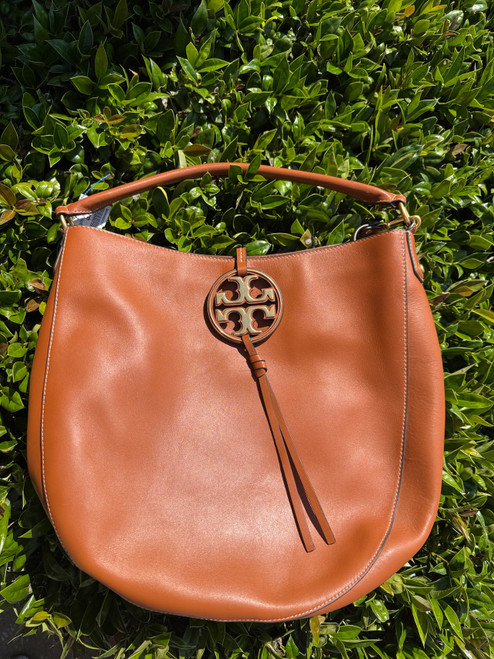 Vist Large View of Product Image Which is Used Tory Burch Large Leather Handbag