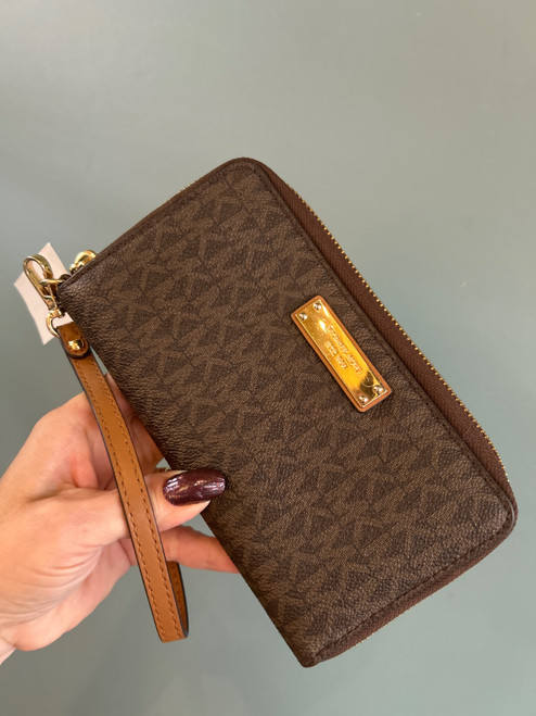Vist Large View of Product Image Which is Used Michael Kors Wristlet