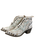 Women’s distressed Circle G white leather Western ankle booties with pointed toes, dark metal studs, turquoise and brown stitching, deep V-cut openings, and rear pull tabs. View 3