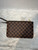 Louis Vuitton Pochette Damien Ebene Leather Wrislet View 1
