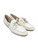 Stuart Weitzman cream leather lace-up boat shoes, angled view View 2