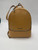 Appears yellow due to lighting - this handbag is tan View 4