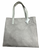 Front view of gently used grey Guess tote bag. Suede like material.  View 1