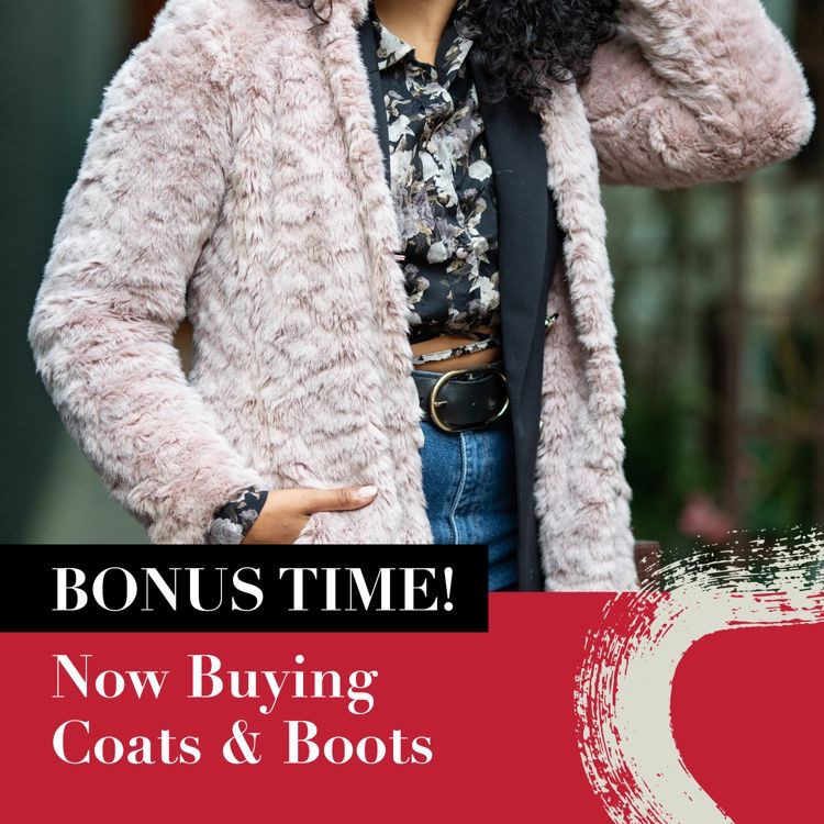 An image of a young woman wearing a fluffy coat