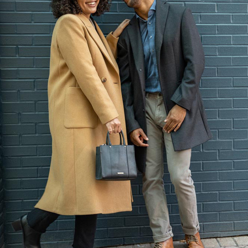 An image of two women in overcoats