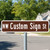 Preview of Brown/White Custom MUTCD Street Sign, 6"x24"