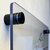 Display of acrylic sign and hardware mount on wall.