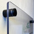 Display of acrylic sign and hardware mount on wall.