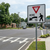 Example of Yield Here To Pedestrians (Left) sign, 36"x36" MUTCD