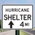 "Hurricane Shelter (Choose Directional Arrow), MUTCD Sign" (Part#: SKEM4-1a), 30x24