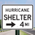 "Hurricane Shelter (Choose Directional Arrow), MUTCD Sign" (Part#: SKEM4-1a), 30x24
