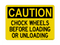 Chock Wheels Before Loading Or Unloading, Caution Sign
