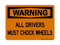 All Drivers Must Chock Wheels, Warning Sign
