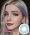 These ethereal light sky Paris Blue contacts will have you batting your fluffy eyelashes and imagining sitting at an adorable café on the Champs-Élysées with a pink cupcake in hand. New Paris Blue circle lenses are so gorgeous, only a fashion capital namesake will do. Each pair of Paris Blue circle lenses is ready to ship fast from the USA with a free contact lens storage case.