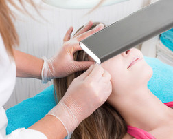 Daylight Co. Table Lamp, LUMINOS, In Use During Facial Treatments 
