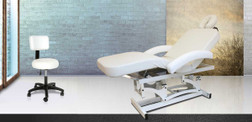 Silhouet-Tone SPA ONE Electric Lift Massage & Treatment Table, Without Cabinet, Pictured in Treatment Room with Technician Stool