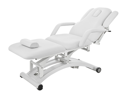 EQUILIBRIUM Electric Massage Table - A beautiful white massage table with sleek lines and a comfortable headrest awaits its next client. The high-quality polyurethane upholstery shines in the light, inviting relaxation and serenity.
