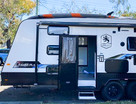 SeaSucker Roof Rack / Board Rack on a Caravan side view