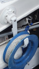 SeaSucker Utility Hook holding hand line in boat