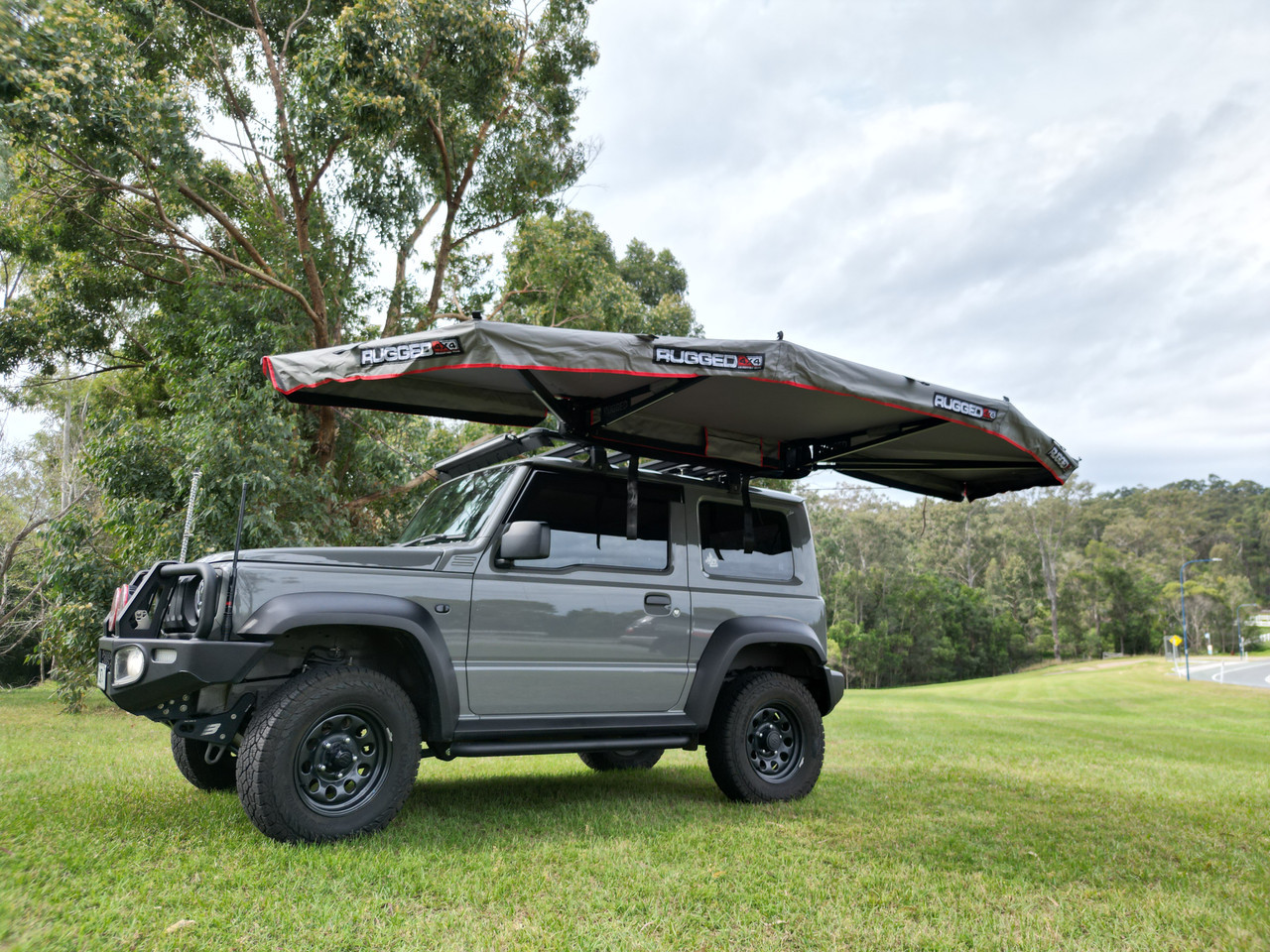 Rugged 4x4 Adventure Gear Rugged 4x4 Platinum 1.5m Semi Automatic 180 Degree Awning (Fabric UVE95+%)  Rugged 4x4 Adventure Gear Rugged 4x4 Platinum 1.5m Semi Automatic 180 Degree Awning (Fabric UVE95+%)