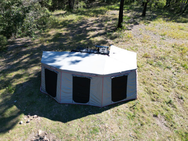 Rugged 4x4 awning wall kit fitted to a 270 degree awning at camp