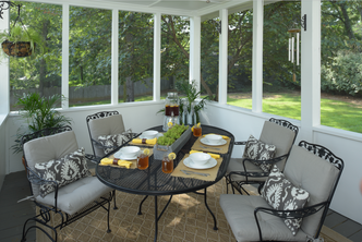 Interior of a screened-in porch with BetterVue screen mesh

