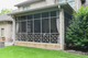 Exterior of a screened-in porch with black Pet Screen installed