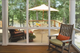 Interior of a screened-in porch with charcoal fiberglass screen mesh installed 