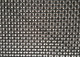 Swatch of black stainless steel roll in black, close up of security screen