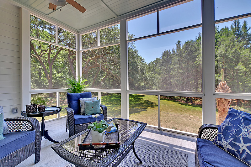 blue-chairs-white-porch-enclosure.jpeg