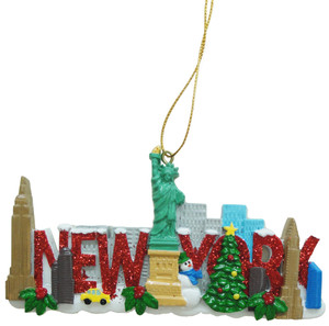 A Christmas Ornament showcasing famous landmarks from New York City, like the statue of liberty, the Empire State Building, and the famous New York skyline. On the bottom is written New York. A Christmas Ornament showcasing famous landmarks from New York City, like the statue of liberty, the Empire State Building, and the famous New York skyline. On the bottom is written New York.