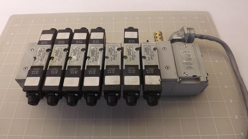 NUMATICS 041SA4Z1GN000F TERMINAL STRIP GROUND CASE W/ 7 SOLENOID VALVES T26217