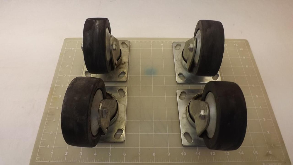 LOT OF 4   HEAVY DUTY CASTER WHEELS T29373