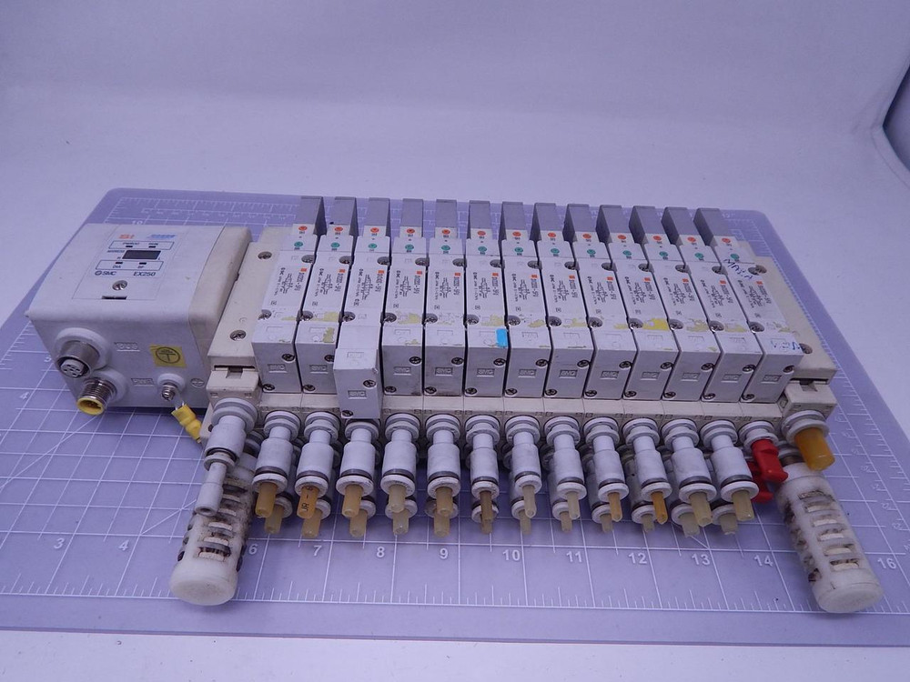 Lot of 13 SMC SV2200-5FU Valves With SI Unit EX250-SPR1 and Manifold T124559 For Sale