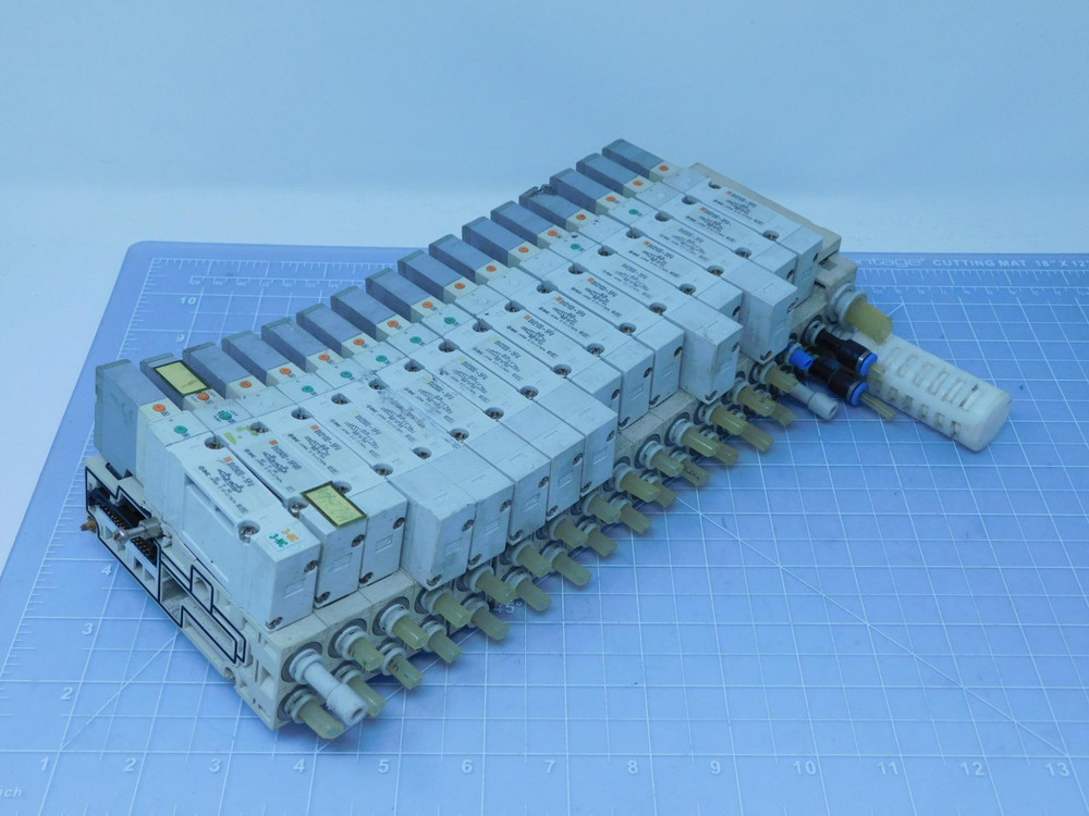 Lot of 6 SMC SV2300-5FU  SV2100-5FU   Solenoid Valves on a  SS5V2-Q3P014 Manifold For Sale
