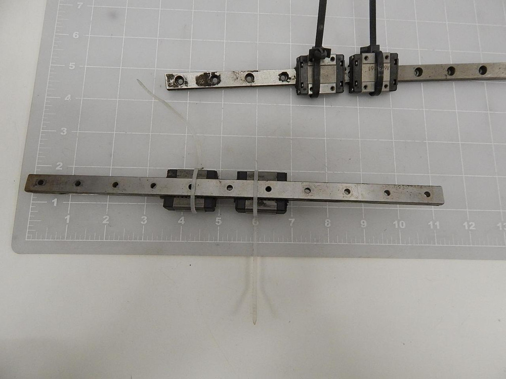 LOT OF 4 THK RSR12VM BEARINGS W/ 11" RAILS T59147