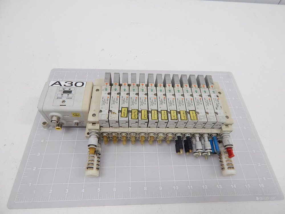 Lot of 13 SMC SV2200-5FU, EX250-SPR1 Solenoid Valves W/ SI Unit T90572 For Sale