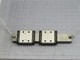 LOT OF 2 THK SRS9W A5H5 LINEAR BEARING BLOCKS ON A 6 IN RAIL T175871