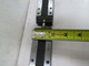 LOT OF 4 THK SHS20LV LINEAR BEARING BLOCKS ON A 58 IN RAIL T189164
