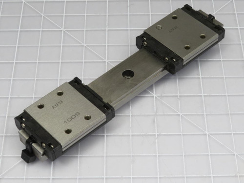 LOT OF 2 THK SRS9W LINEAR BEARING BLOCKS ON A 4 IN RAIL T192737