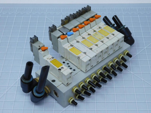 Lot of 8 SMC SY3140-5LZE Solenoid Valves with Manifold T125676 For Sale