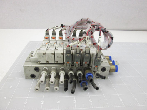 LOT OF 7 SMC SY5140-5M0ZE SOLENOID VALVES W/ MANIFOLD ASSEMBLY T59568