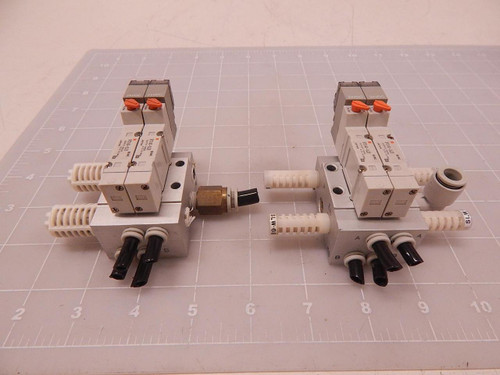 LOT OF 4 SMC SY3140-5LZE SOLENOID VALVES W/ MANIFOLD T83420