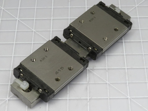 LOT OF 2 THK SRS9W LINEAR BEARING BLOCKS ON A 4 IN RAIL T192736