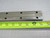 LOT OF 2 THK HRW27 LINEAR RAIL BEARING GUIDE BLOCKS ON 25 IN RAIL T172269