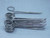 LOT OF 10 8" CURVED LOCKING FORCEPS WITH SERRATED JAWS T128790