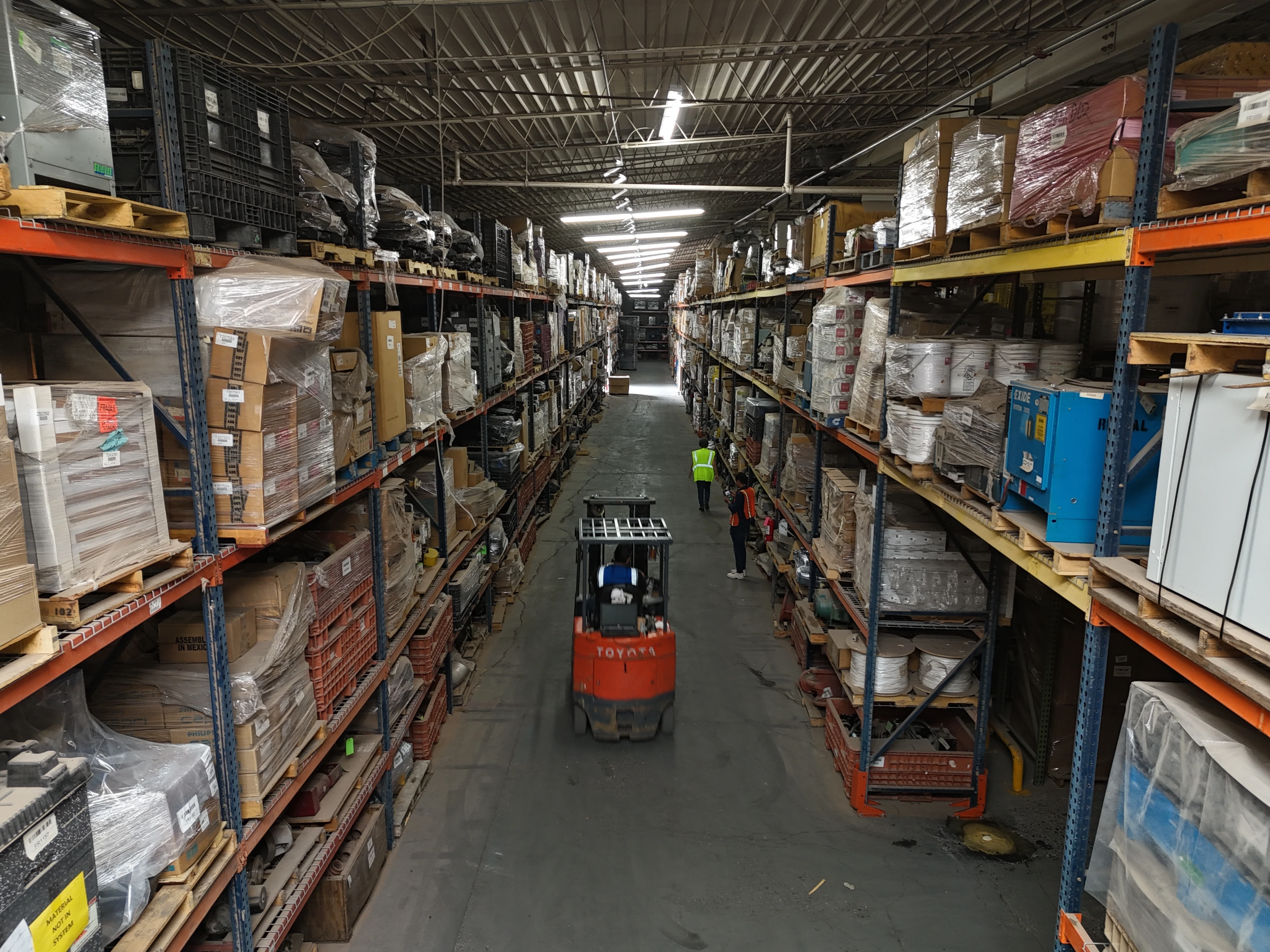 Forklift moving through the warehouse