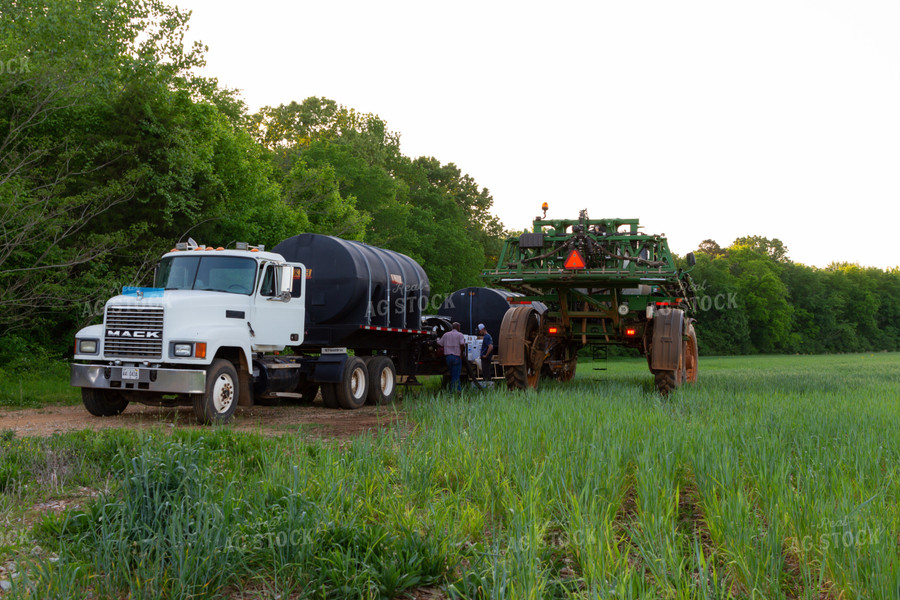 Male Farmers Filing Up Sprayer 79004