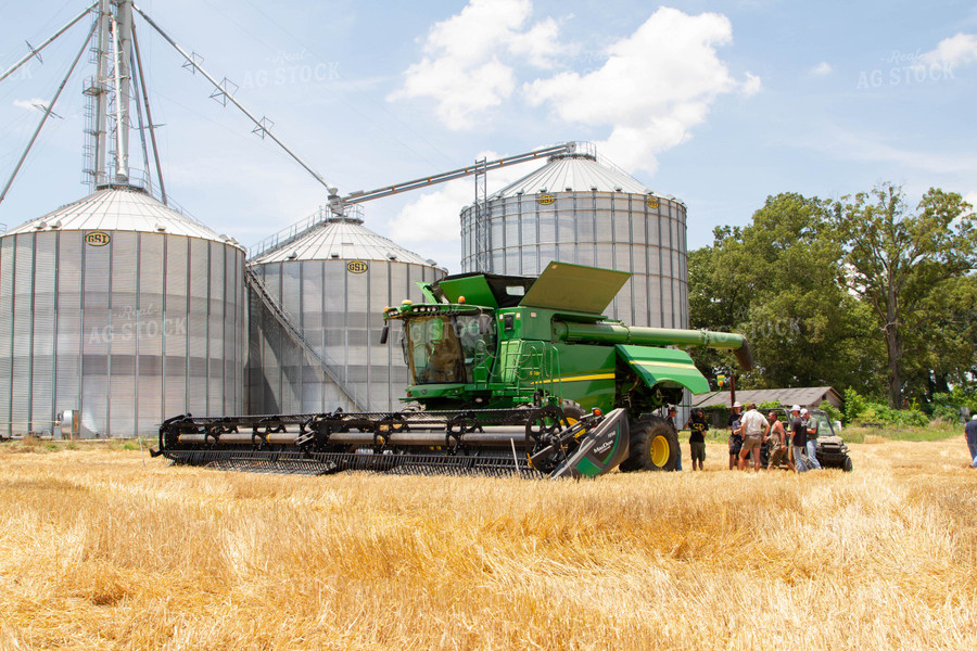 Combine in Wheat Field with Farmers 79054