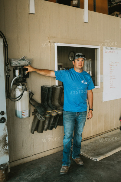 Farmer Opening Shop Door 6187